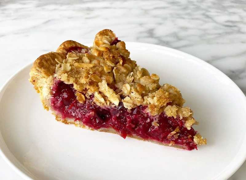 the par baking started out a little dicey but I just pushed the crust back down and everything turned out swell. filling is a bag of frozen sweet cherries…