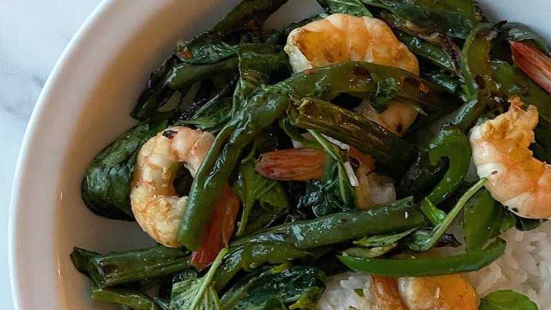 photo of completed recipe: Got green beans and basil in this week’s CSA haul which became this delicious dish inspired by the Six Seasons grilled beans with basil and spicy fish…