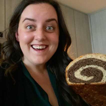 Remove the bread from the oven and the pan and then let cool as much as you can stand (ideally completely, but at least an hour) before slicing.