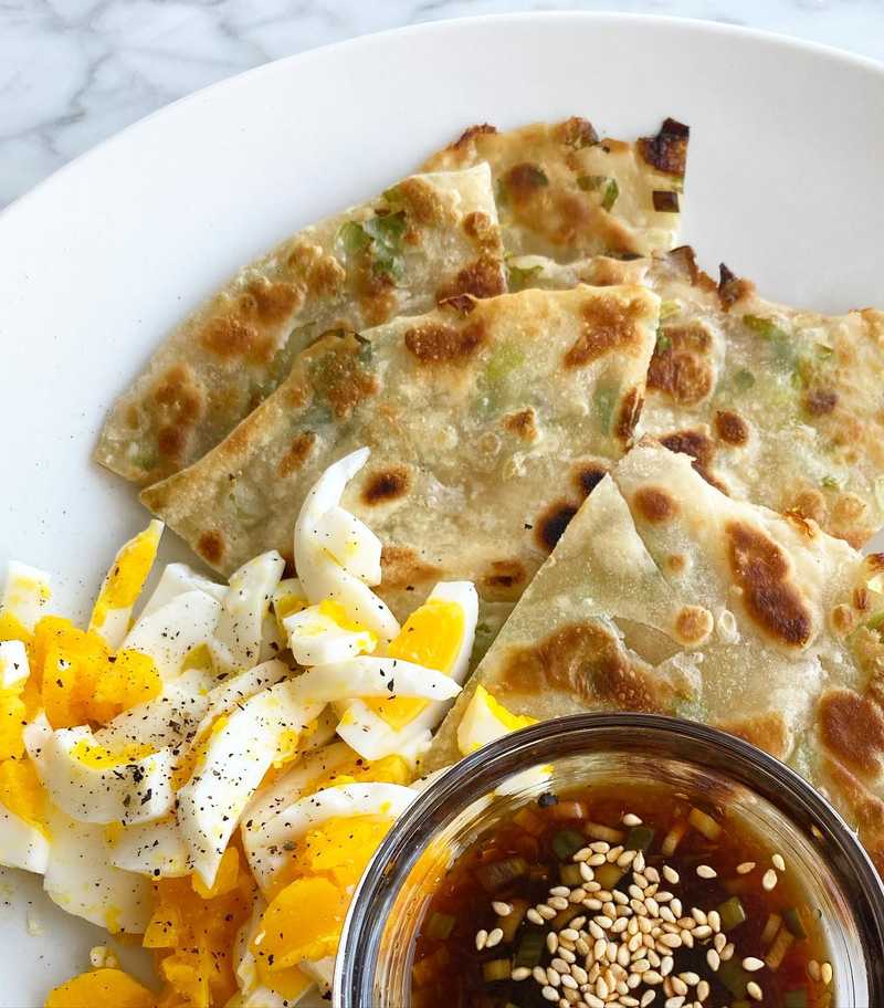Not the prettiest picture but very tasty. Scallion pancake from the freezer, chopped hard boiled egg, soy/scallion sauce from the back of the fridge (I don…